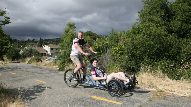 Homemade Tandem Tricycle Helps Young Man After Brain Injury