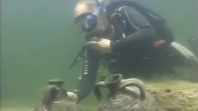 Vladimir Putin Discovers 6th Century Artifacts While Scuba Diving