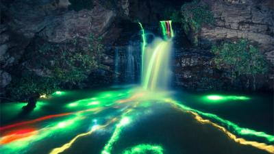 Putting Glowsticks Inside Waterfalls Is Mesmerisingly Beautiful