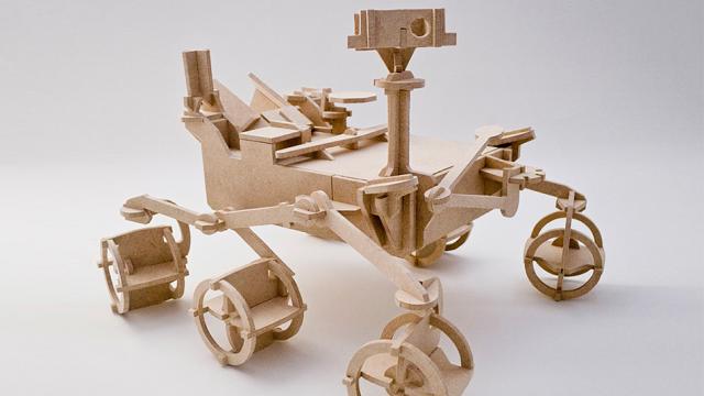Explore The Dark Side Of Your Desk With This Wooden Curiosity Model