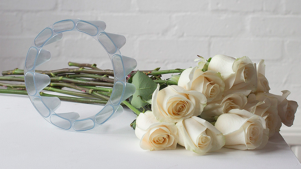 Clever Plastic Brace Turns Long-Stemmed Flowers Into Their Own Vase