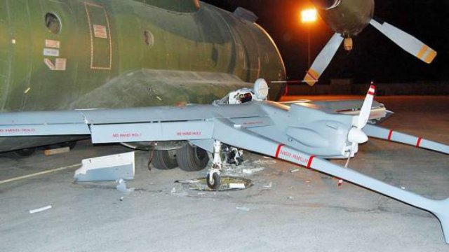 Watch This German UAV Crash Into A Plane On An Afghan Runway