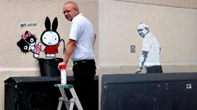 Street Artist Replaces Erased Work With Stencil Of Guy Who Erased It