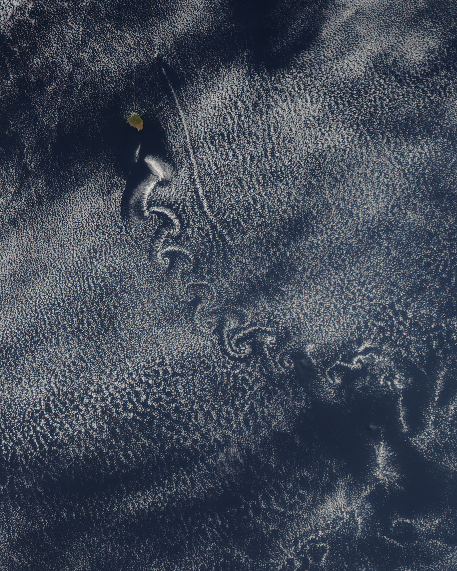 These Trippy Spirals Are An Island’s Atmospheric Exhaust