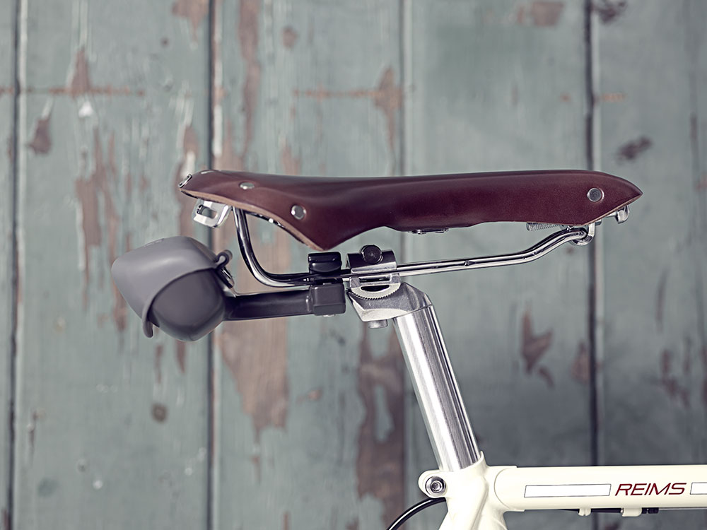 This Brilliant Bike Accessory Keeps Your Helmet Safe And Your Butt Dry