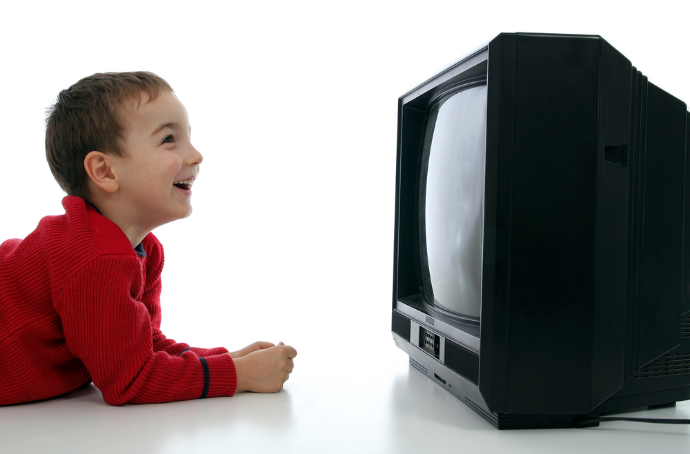 People Smiling At Blank Television Screens