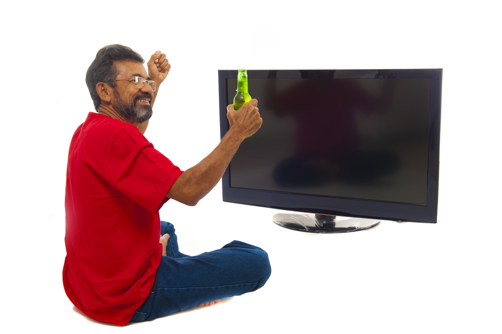 People Smiling At Blank Television Screens
