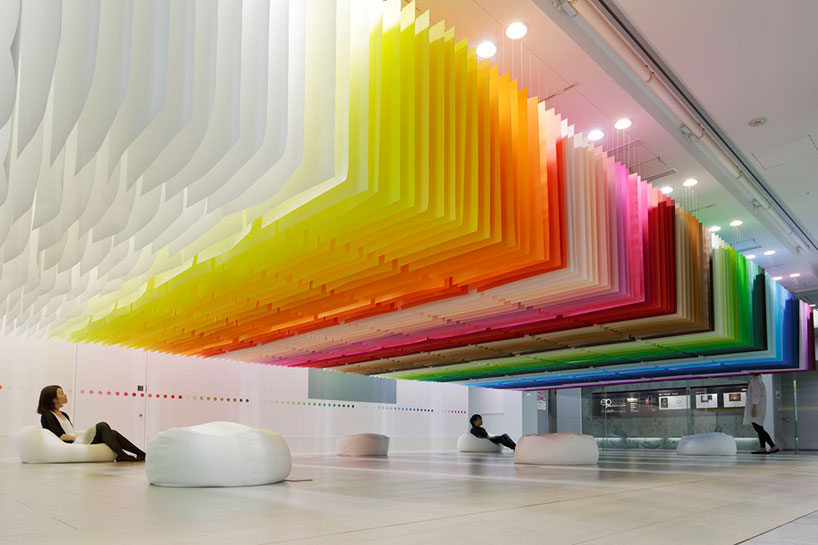 A Giant Paper Installation That Looks Like Sitting Inside A Rainbow