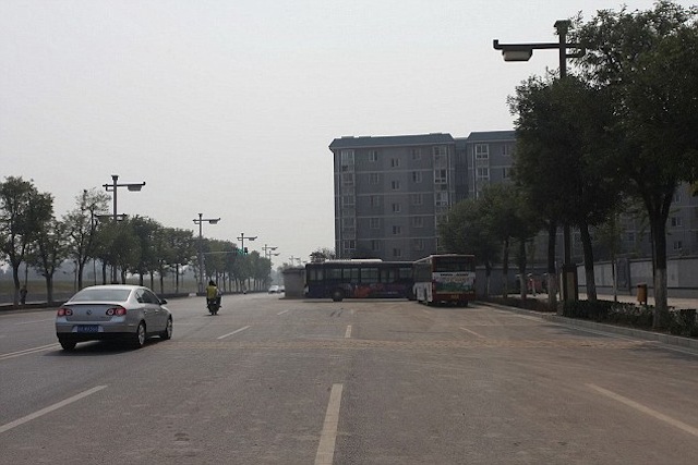 China Accidentally Built A Housing Complex In The Middle Of A Highway