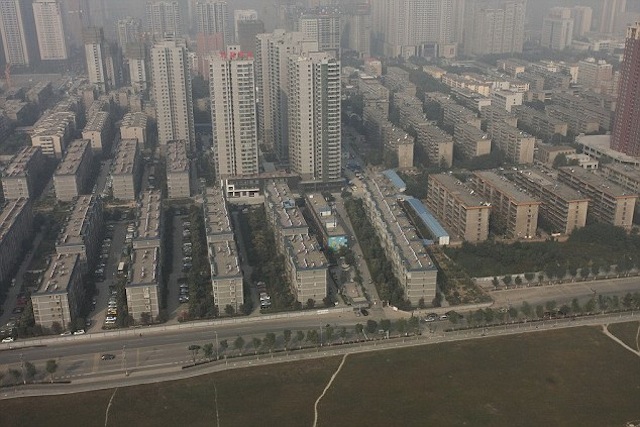 China Accidentally Built A Housing Complex In The Middle Of A Highway