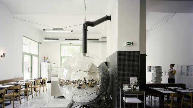 This Groovy Pizzeria Has Its Own Spinning Disco Ball Oven