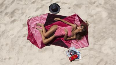 These Geometric Water-Wicking Beach Towels Make Drying Off A Breeze