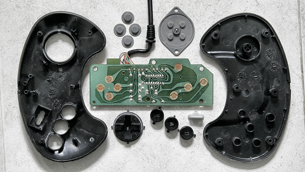 Deconstructed Gaming Controllers Reveal Gorgeous Old School Guts
