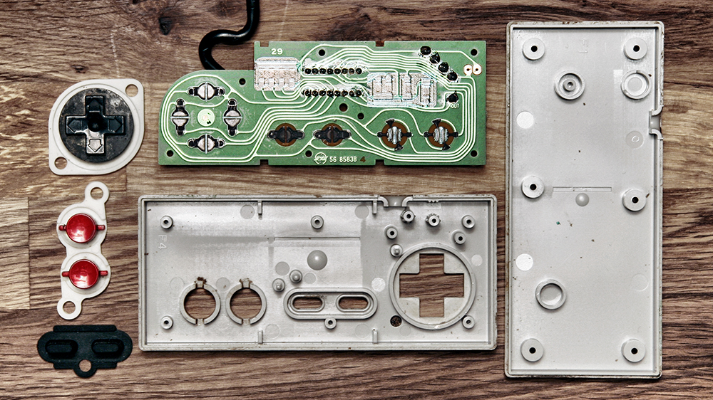 Deconstructed Gaming Controllers Reveal Gorgeous Old School Guts