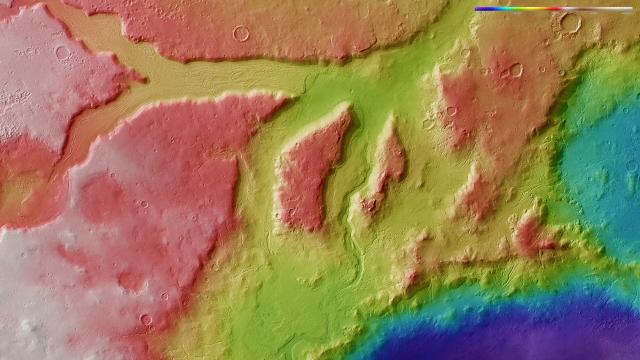The Red Planet’s Deep Valleys In Kaleidoscopic Colour