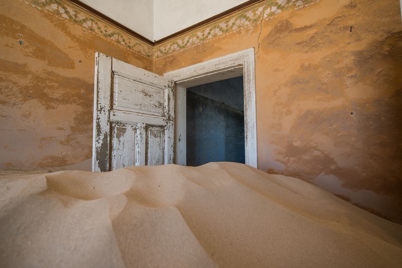 Colourful Desert Ruins Consumed By Waves Of Sand