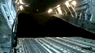 Crazy Video: Heavy Military Trucks Being Dropped From A Plane