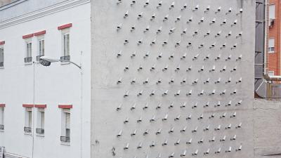 Artist Installs 150 CCTV Cameras On Side Of Building