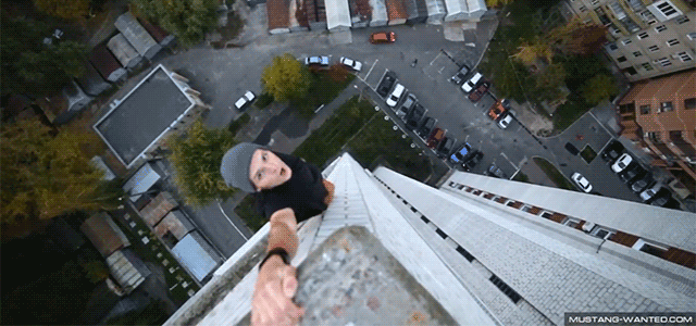 Terrifying Video Of Fearless Kids Hanging From Buildings With One Hand