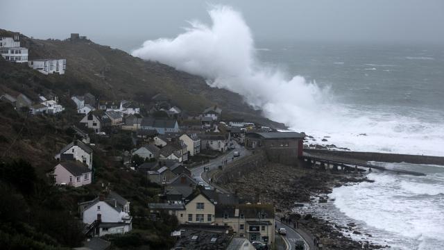 Holy Crap, Look At This Giant Wave Towering Over An Entire English Town