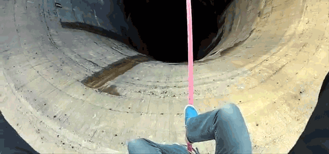 Insane Video: Guy Walks Slackline Over 60m Pit Without Any Safety
