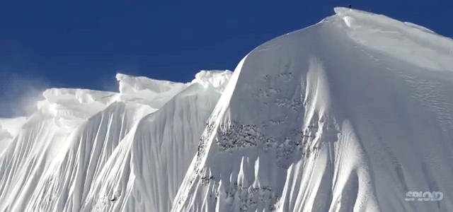 I Can’t Believe This Dude Snowboarded Down This Snow Wall