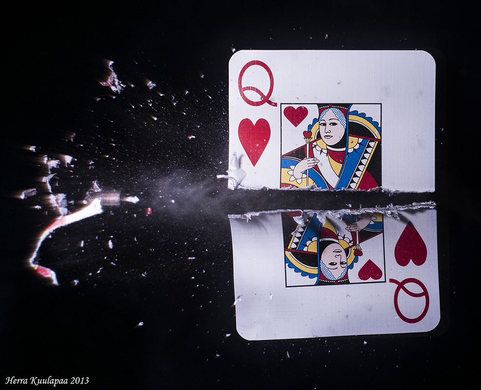 Awesome Photo Of A Bullet Cutting A Card, And Other High-Speed Images