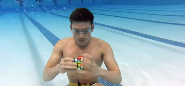 Genius Fish Human Solves Three Rubik’s Cubes Underwater In One Minute