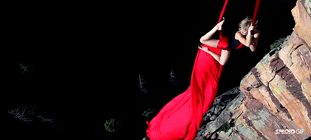 Woman Risks Her Life Aerial Dancing Over Cliff In Beautiful Video