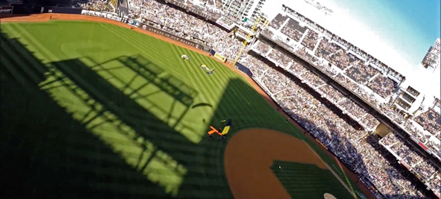 Watch The US Navy Parachute Team Jump And Land Inside A Stadium