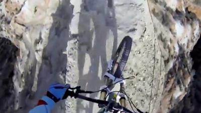 Watching This Guy Mountain Bike Down A Rocky Narrow Cliff Is Insanity