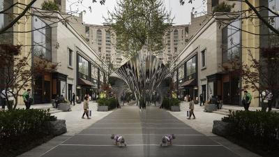 This Twisting Mirror Bridge Reflects Every Detail Of A Shanghai Street