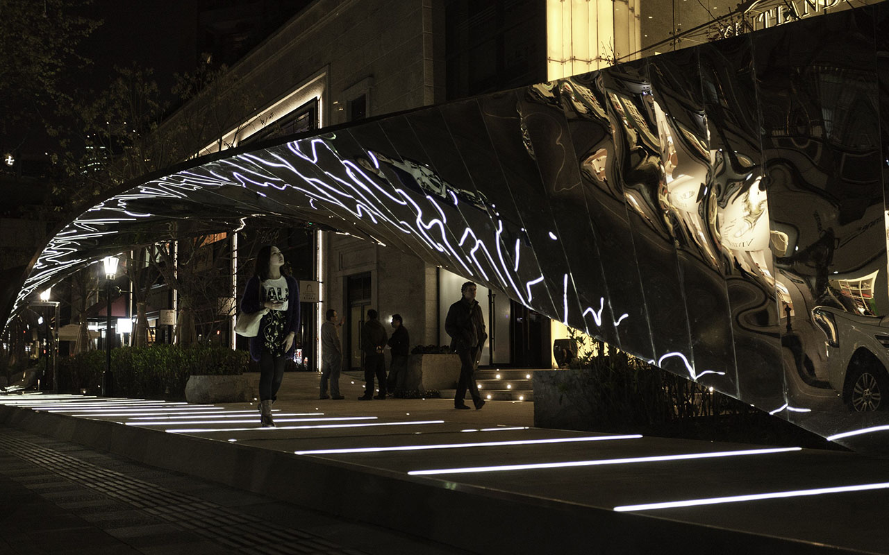 This Twisting Mirror Bridge Reflects Every Detail Of A Shanghai Street