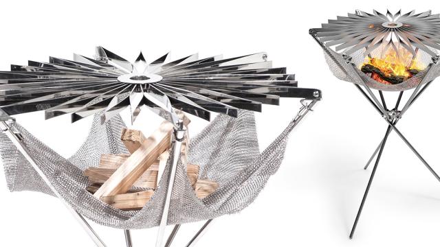 This Folding Origami Grill Has A Metal Mesh Hammock For Firewood
