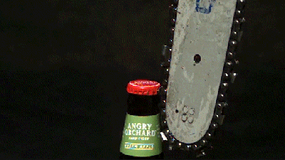 Watch A Chainsaw Open A Beer In Glorious Slow Motion