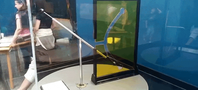 Watch A Straight Rod Somehow Pass Through A Curved Hole Without Bending