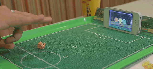 A Smartphone Turns These Fast Food Trays Into Tiny Soccer Fields