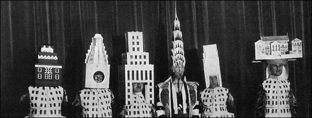 Crown Or Dunce Cap? Starchitects Wear Their Famous Buildings As Hats