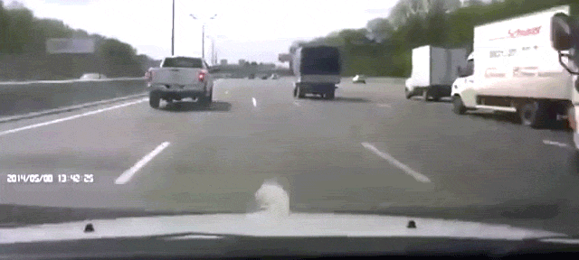 Flying Tyre Crashes Into A Car On The Road