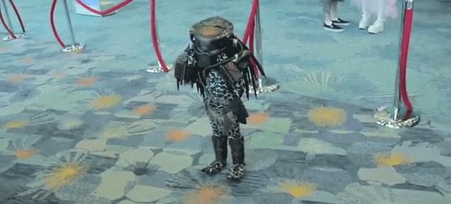 Little Kid Dresses Up In A Mini Predator Costume