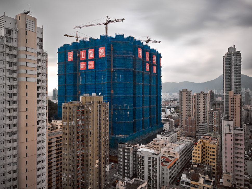 The Surreal Site Of Skyscrapers Encased In Coloured Fabric
