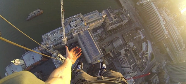 Guy Jumps Over Huge Gap To Hang 150m Above London With One Hand