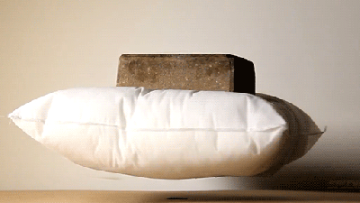 Watch A Floating Pillow Somehow Support The Weight Of A Brick
