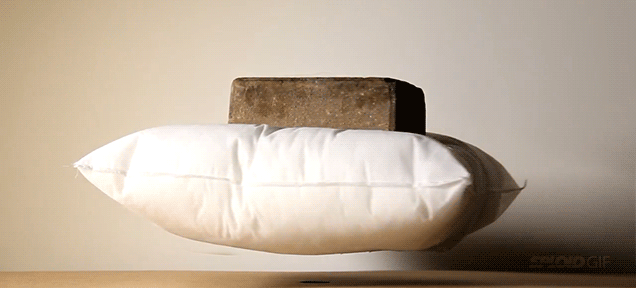 Watch A Floating Pillow Somehow Support The Weight Of A Brick