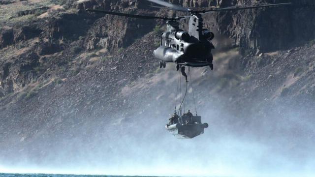 US Army Helicopter Drops An Entire Boat Full Of Navy Seals In The Sea