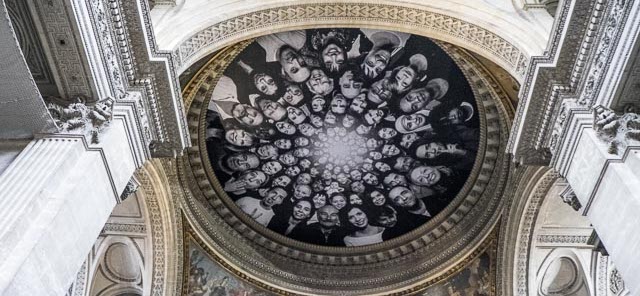 Why The Panthéon Is Covered In Black-And-White Faces