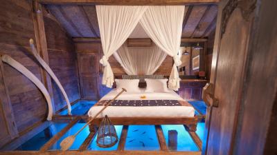 This Glass-Bottomed Hotel Room Lets You Sleep With The Fishes