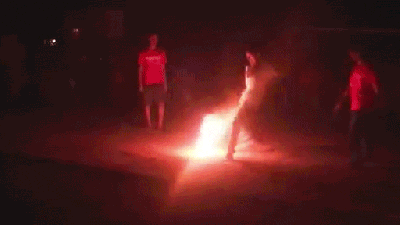 People Play Soccer Barefoot With A Ball That’s On Fire
