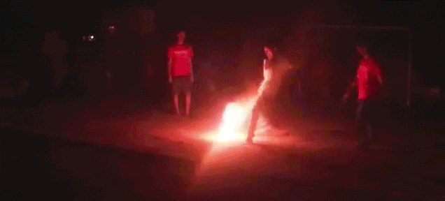People Play Soccer Barefoot With A Ball That’s On Fire
