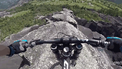 Extreme Biker Rides Through The Narrowest Mountain Edge I’ve Ever Seen